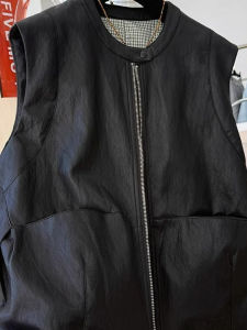 เสื้อกั๊กหนัง PU แขนกุด ทรงหลวม สำหรับผู้หญิงไซส์ใหญ่ ฤดูใบไม้ผลิ 2025 เสื้อคลุมกันหนาวแบบสวมหัว ทรงหลวม แขนกุด