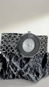 Classy Watch for Woman Featuring Big Face Black - Glass Bezel and Perforated Broad Band