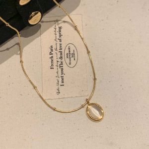 Womens Titanium Steel Cats Eye Stone Pendant Necklace Fashionable Lightweight Luxury out Snake Bone Chain Jewelry