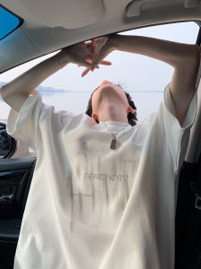 เสื้อยืดแขนสั้นผ้าฝ้ายแท้สำหรับผู้ชาย ทรงหลวม ลำลอง สีขาว คอลเลกชั่นฤดูร้อน แฟชั่นสตรีท เสื้อผ้าทำงาน ดีไซน์การ์ตูน สไตล์อเมริกัน