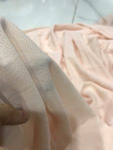 vải voan xốp màu cam sữa _( khổ 1m5) co dãn nhẹ mềm rũ may đầm váy áo kiểu