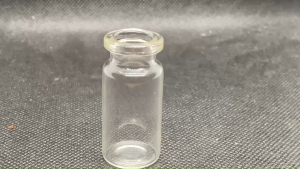 ขวด 7 มล.(247 ใบ) แก้วกลมใส (ไม่มีเกลียว) + ฝาสีมุก