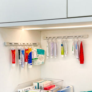 Punch-Free Wall-Mounted Cream Storage Rack Tube-shaped Space Saver for Medicine Creams And Pastes Simple Design Plastic Material