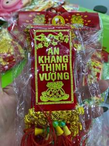 Liễn treo khánh treo trang trí cây cành vàng lá ngọc cây đào quất ngày tết