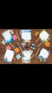 Writing Pad with Ocean Beach and Floral Designs - Note Paper with Decorative Borders - Stationery for Journaling or Notes - Wood Background with Pens and Sticky Notes