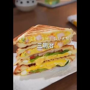 เครื่องทำอาหารเช้าแบบเบาสำหรับใช้ในบ้าน แบบมัลติฟังก์ชัน เครื่องทำแซนด์วิช แผ่นเหล็กไฟฟ้า ขนมปังปิ้ง เครื่องกดขนมปัง