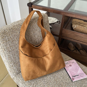 กระเป๋าสะพายไหล่ผู้หญิงขนาดใหญ่ความรู้สึกหรูหรา กระเป๋าถือทรงถังแบบลำลองสำหรับใช้ในชีวิตประจำวันและไปทำงาน