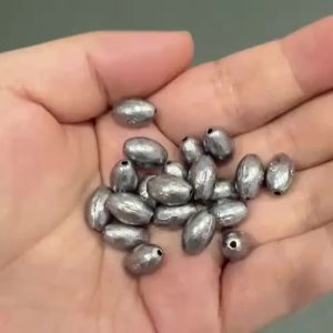 20-Piece Set of Olive-Shaped Hollow Sinking Weights - Iron-Lead Alloy Fishing Sinkers with Grooves for Sea Fishing