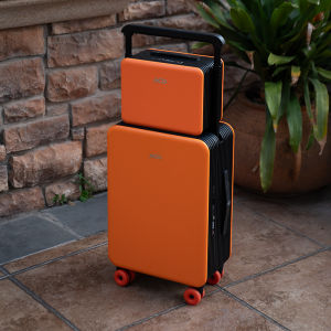 Cabin-friendly Orange Luggage