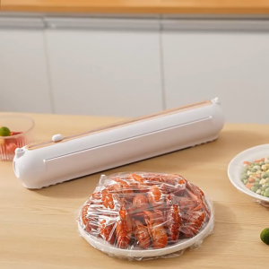 Simple Japanese style magnetic wall mounted kitchen cling film cutter with adjustable dividers for storage cutting tin foil mesh paper baking paper