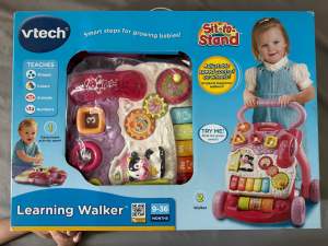 Vtech Learning Walker Sit-to-Stand Adjustable Speed Control on Wheels for 9-36 Months.