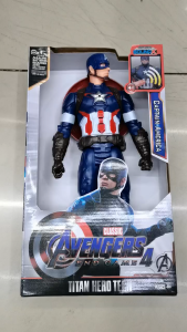 Captain America Action Figure with Shield and Accessories. Blue costume with star emblem red and white stripes brown boots and shield. Displayed in branded packaging.