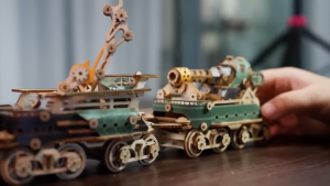 HowCat Red Fantasy Steampunk Train DIY Wooden Puzzle (S1350) 3D Wooden & Paper Puzzle