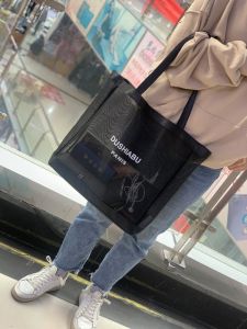 กระเป๋าสะพายไหล่แบบทันสมัย ​​กระเป๋าใส่ของใสตาข่ายขนาดใหญ่สำหรับผู้หญิง กระเป๋าซักได้ กระเป๋าใส่ของแบบโปร่งใส กระเป๋าเดินทางแบบลำลอง