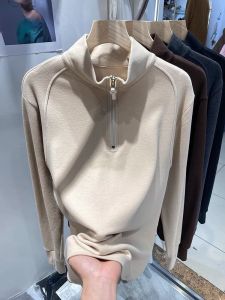 เสื้อสเวตเตอร์คอตั้งสองด้านแบบมีซิปสำหรับผู้หญิงในฤดูหนาวปี 2023 เสื้อเชิ้ตแขนยาวทรงหลวมสไตล์เกาหลี INS เสื้อคลุมกันหนาวแบบสวมหัว