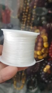Cuộn Dây Thun CO GIÃN màu Trắng xỏ vòng hạt chuỗi giá 40k/1 cuộn ạ
