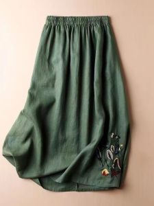 กระโปรงยาวปานกลางผ้าลินินปักลายเอวสูงสไตล์ย้อนยุคสำหรับผู้หญิง กระโปรงทรงเอเข้ารูป กระโปรงสั้น ฤดูใบไม้ผลิ 2025