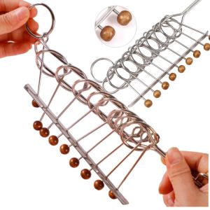 ชุดปริศนาวงแหวนโลหะ 9 ชิ้น เกมไขปริศนาห่วงโซ่ ของเล่นเสริมสร้างสติปัญญา วงแหวนห่วงโซ่ ของตกแต่งวัฒนธรรมจีน