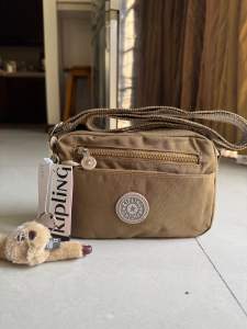 Kipling Abanu Small Phone Bag Polyester Metal Hardware Sling for Men and Women 13cm Height 4.5cm Width 19.5cm Length