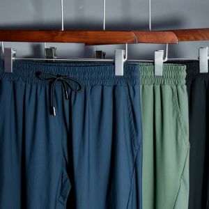 KAMB celana training panjang pria slim fit