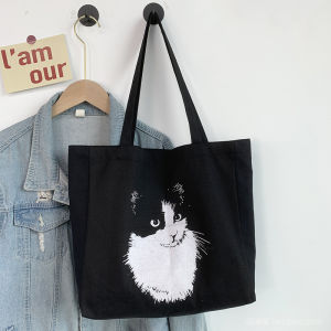 แมวน่ารักผ้าใบกระเป๋ากระเป๋าสะพายขนาดใหญ่สําหรับนักเรียนสไตล์ลําลองลมเกาหลีฤดูร้อนแฟชั่นกระเป๋าเดินทางหญิง