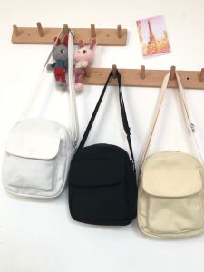 กระเป๋าสี่เหลี่ยมเล็กผ้าใบสีพื้นสไตล์เกาหลี กระเป๋าสะพายข้างผู้หญิง กระเป๋าสะพายไหล่แบบลำลอง กระเป๋าสะพายข้างแบบสะพายข้าง