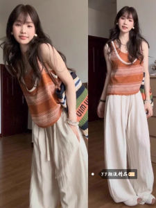 เสื้อกั๊กถักแขนกุดลายทางสีสันสดใสสำหรับผู้หญิงในฤดูหนาว 2025 ใหม่ ดีไซน์เก๋ไก๋ ไม่มีแขน ใส่ได้ทั้งในและกลางแจ้ง