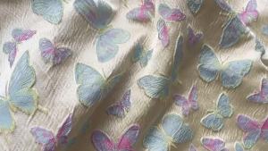 ผ้าสำหรับเย็บผ้าผ้าแจ็คการ์ดลายนูนรูปผีเสื้อทำจากผ้าเสื้อผ้าแฟชั่นหรูหราแบบทำมือ