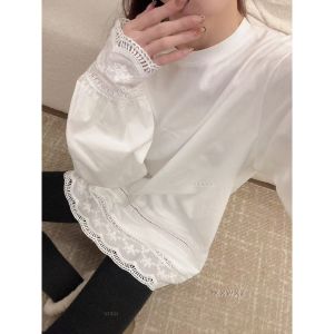 เสื้อยืดคอกลมแขนยาวลายปักสีพื้นทรงหลวมสไตล์เรียบง่ายสำหรับผู้หญิงในฤดูใบไม้ร่วงและฤดูหนาว