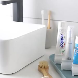 HL001 Multipurpose Toothpaste Squeezer Dispenser Toothpaste Stand Portable Rotatable Facial Wash Squeezer