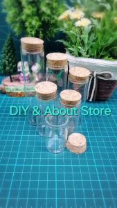 ขวดแก้วทรงกระบอกทรงสูง มีให้เลือกขนาดฝาคละสี