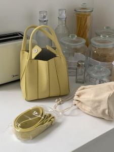 กระเป๋าถือทรงถังสไตล์เกาหลี ดีไซน์เก๋ไก๋ กระเป๋าสะพายไหล่แบบอเนกประสงค์สำหรับผู้หญิง กระเป๋าถือแบบพกพาขนาดเล็ก กระเป๋าสะพายข้าง PU ทรงกลม