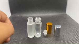 ขวด 5 มล.(12ใบ) แก้ว กลมใส+ลูกกลิ้ง + ฝา