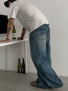 กางเกงยีนส์ทรงหลวมขาบานสไตล์อเมริกันย้อนยุค สีน้ำเงิน กางเกงขายาวทรงหลวมสำหรับผู้ชาย ทรงลำลอง สไตล์ย้อนยุค