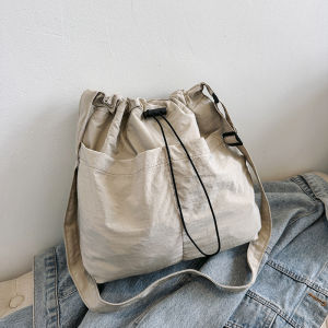 Trendy Large Capacity Canvas Tote Bag Womens Commuter Bucket Bag Versatile Fashionable Single Shoulder Slant Cross Bag