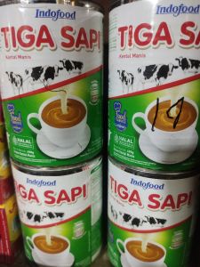 susu indofood tiga sapi (gratis royco sacet 1 pc)