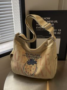 Large Capacity Canvas Tote Bag Fashionable Letter Print Commuter Shoulder Bag for Women Ideal for Class And Travel