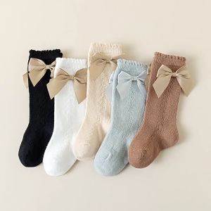 ถุงเท้ายาวถึงน่องสำหรับเด็ก ถุงเท้าเด็กโบว์ใหญ่สีหวาน รุ่น YQ 700