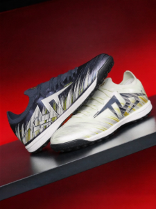 Shock Absorbing and Torsion Resistant Soccer Shoes