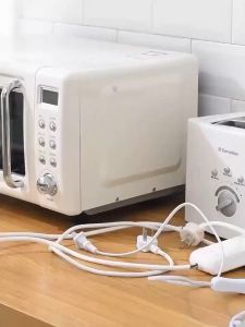 BIBLIO Plug Holder: Wall-Mounted Power Cord Storage & Adhesive-Free Punch Bracket