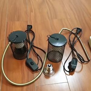 ĐÈN SƯỞI THÚ CƯNG. KHÔNG PHÁT SÁNG CÓ LỒNG BẢO VỀ VÀ TĂNG GIÁM NHIỆT ĐỘ