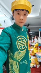 áo dài bé gái Phượng Hoàngchua kem man doi