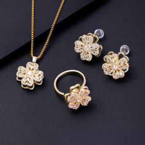 Popular Jewelry 4-Piece Set Super Flash Rotatable Four-Leaf Clover Ring Accessible Luxury Niche Exquisite Bracelet Crystal Necklace Womens Ear Hook