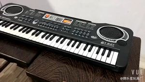 ĐÀN PIANO ĐIỆN TỬ CHO BÉ 61 PHÍM _____ cho bé tập làm nhạc sĩ tặng kèm mic và dây sạc USB