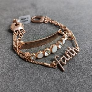 DaVee gold plated crystal jewelry shell bracelet with "blessed" charm white and clear stones gold bar casual wear.