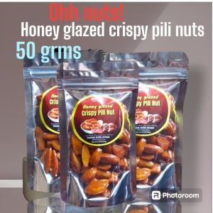 HONEY GLAZED CRISPY PILI NUTS 50 grms (ziplock silver pouch )bicol product with pure honey