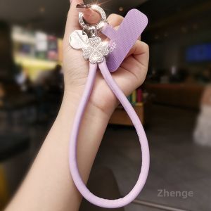 ZHENGEGE | Stylish and Convenient Diamond Clover Phone Strap