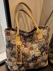 Spring 2025 Large Capacity Canvas Tote Bag Womens Commuter Single Shoulder Handbag Casual Shopping Bag Soft Fabric Zipper Closure