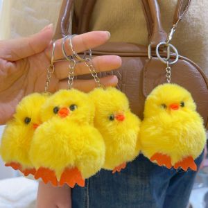 กระเป๋านุ่มตุ๊กตาพวงกุญแจเป็ดสีเหลืองน้อยน่ารัก2ชิ้นเครื่องประดับพวงกุญแจเครื่องประดับในรถยนต์วันเกิดสำหรับเด็กของขวัญ
