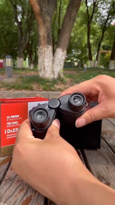 กล้องส่องทางไกลออโต้โฟกัส 10X25 โฟกัสฟรีกล้องส่องทางไกล HD Night Vision สำหรับผู้ใหญ่กลางแจ้งมินิคอนเสิร์ต